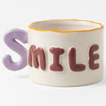Taza Tarro De Cerámica Con Relieve Asa Con Forma Multicolor Smile 1784-45