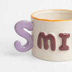 Taza Tarro De Cerámica Con Relieve Asa Con Forma Multicolor Smile 1784-45